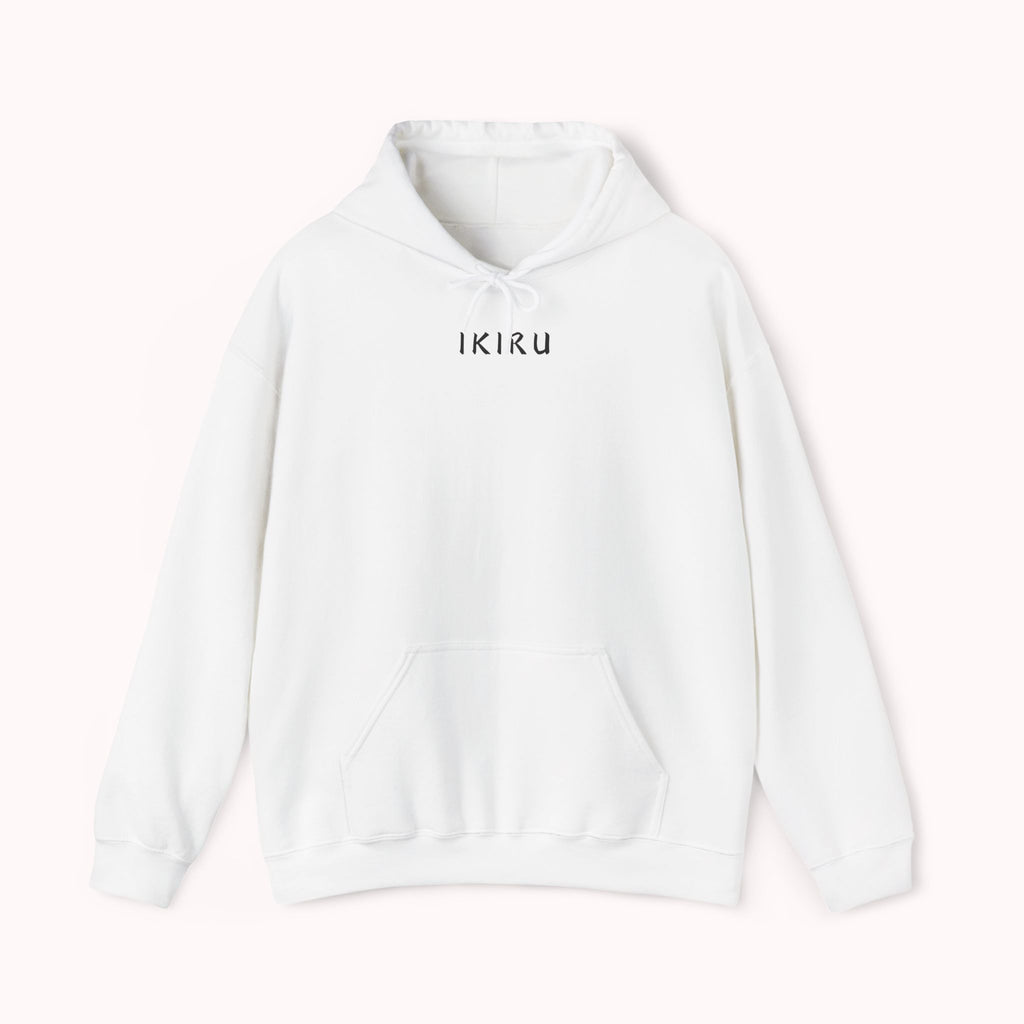 White hoodie with 'IKIRU' and mountain, samurai, and blossom tree design on the back saying 'un-influenceable' against a white background
