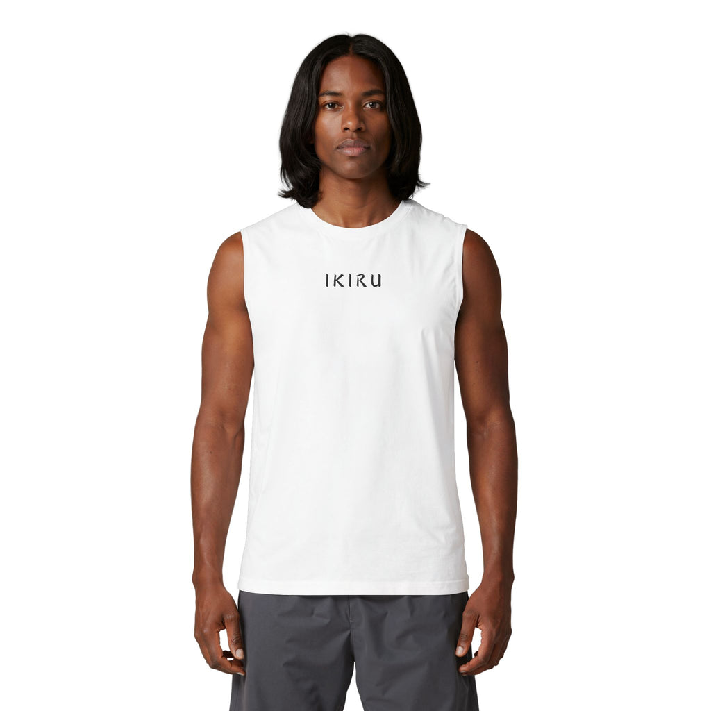 Man wearing a white sleeveless shirt with text on a white background