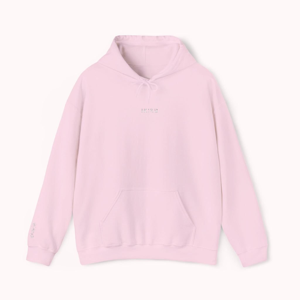 Pink hoodie with IKIRU logo on a white background