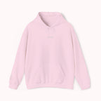 Pink hoodie with IKIRU logo on a white background