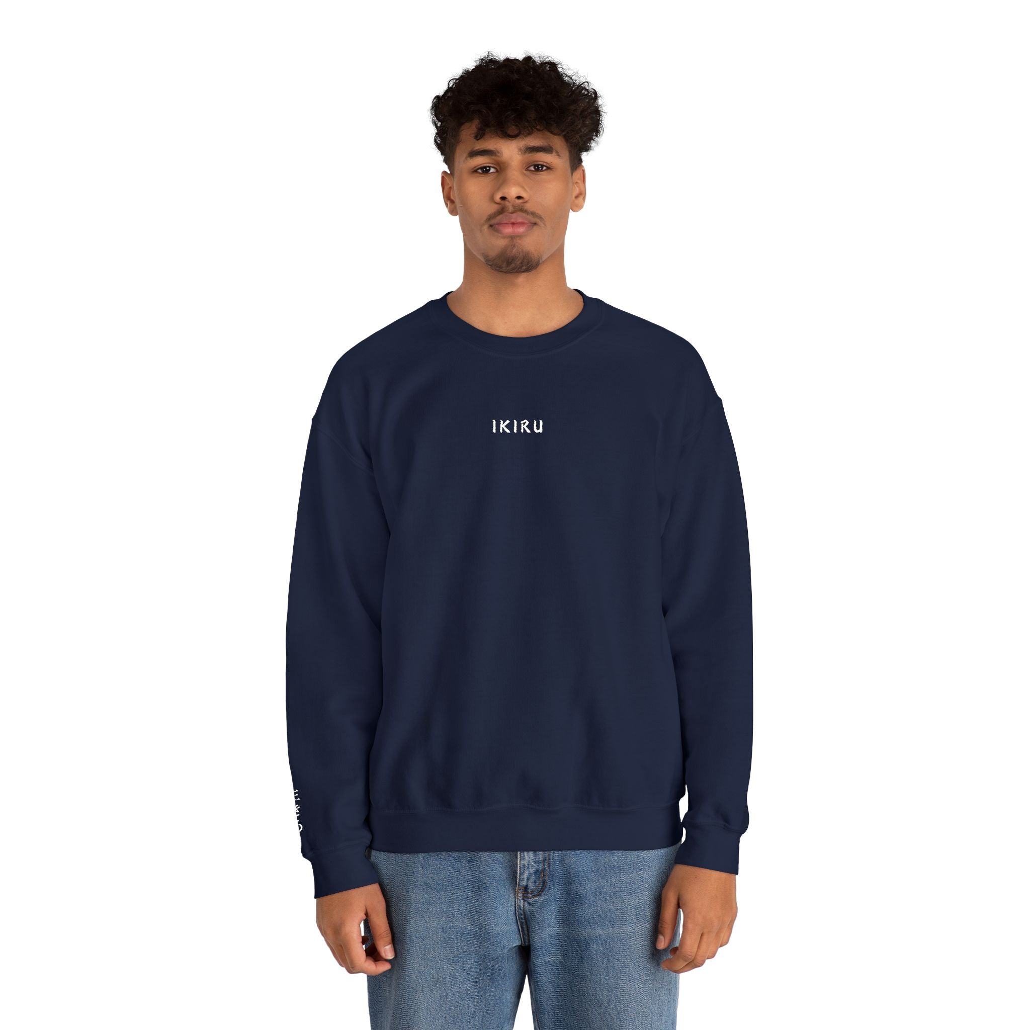 Person wearing a navy blue sweatshirt with IKIRU logo on a white background