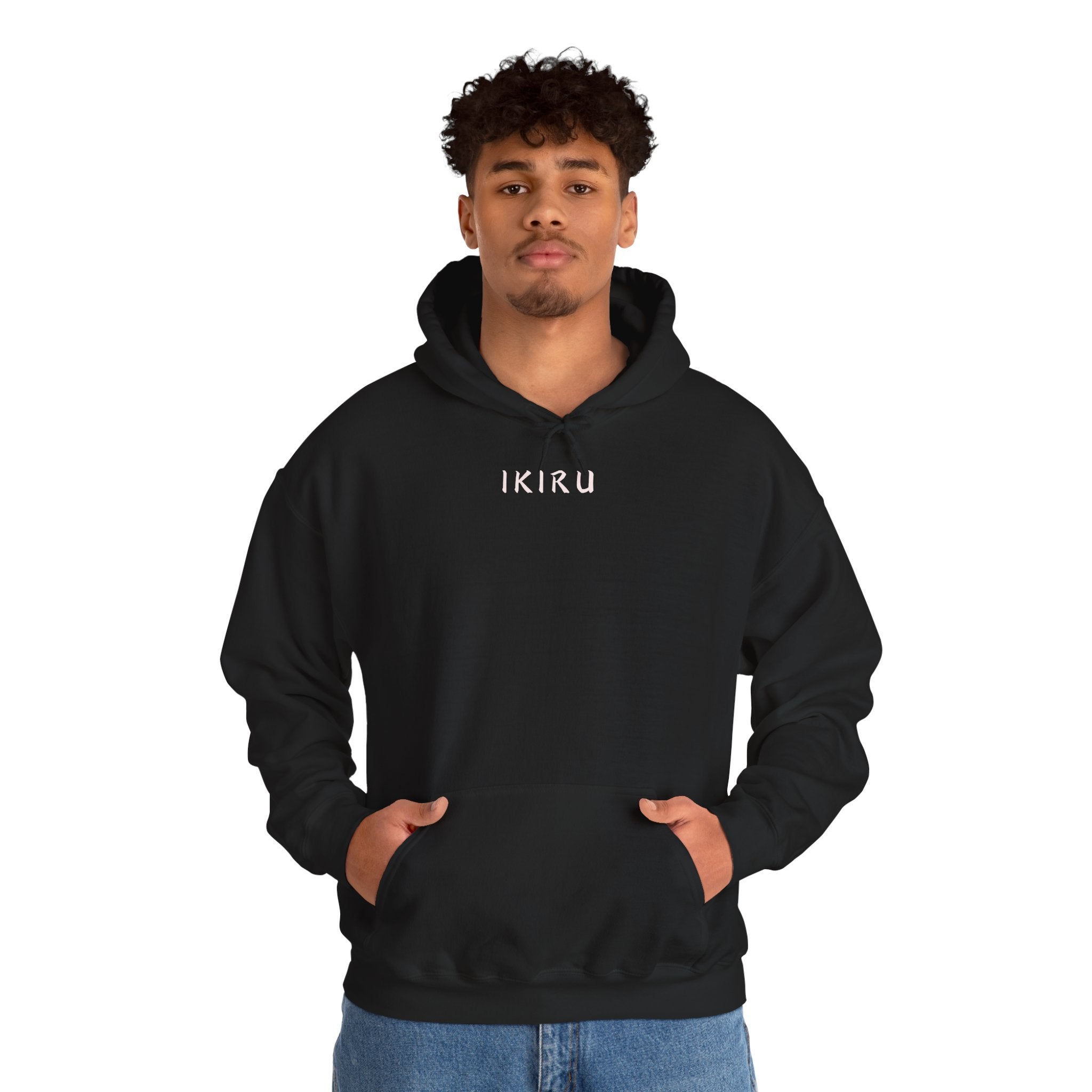 Black hoodie with 'IKIRU' and mountain, samurai, and blossom tree design on the back saying 'un-influenceable' against a white background