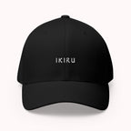 Black cap with IKIRU branding on a white background