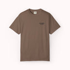brown t-shirt with 'Not present, I'm alive' text and loading symbol on a textured white background