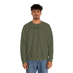 Person wearing a green sweatshirt with a small ikiru logo on a white background