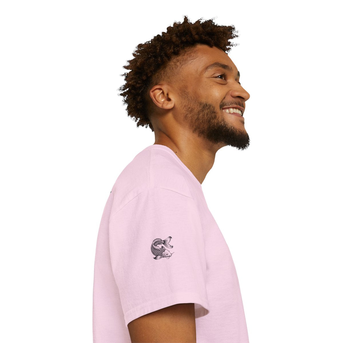 Person wearing a pink t-shirt with IKIRU branding on a white background