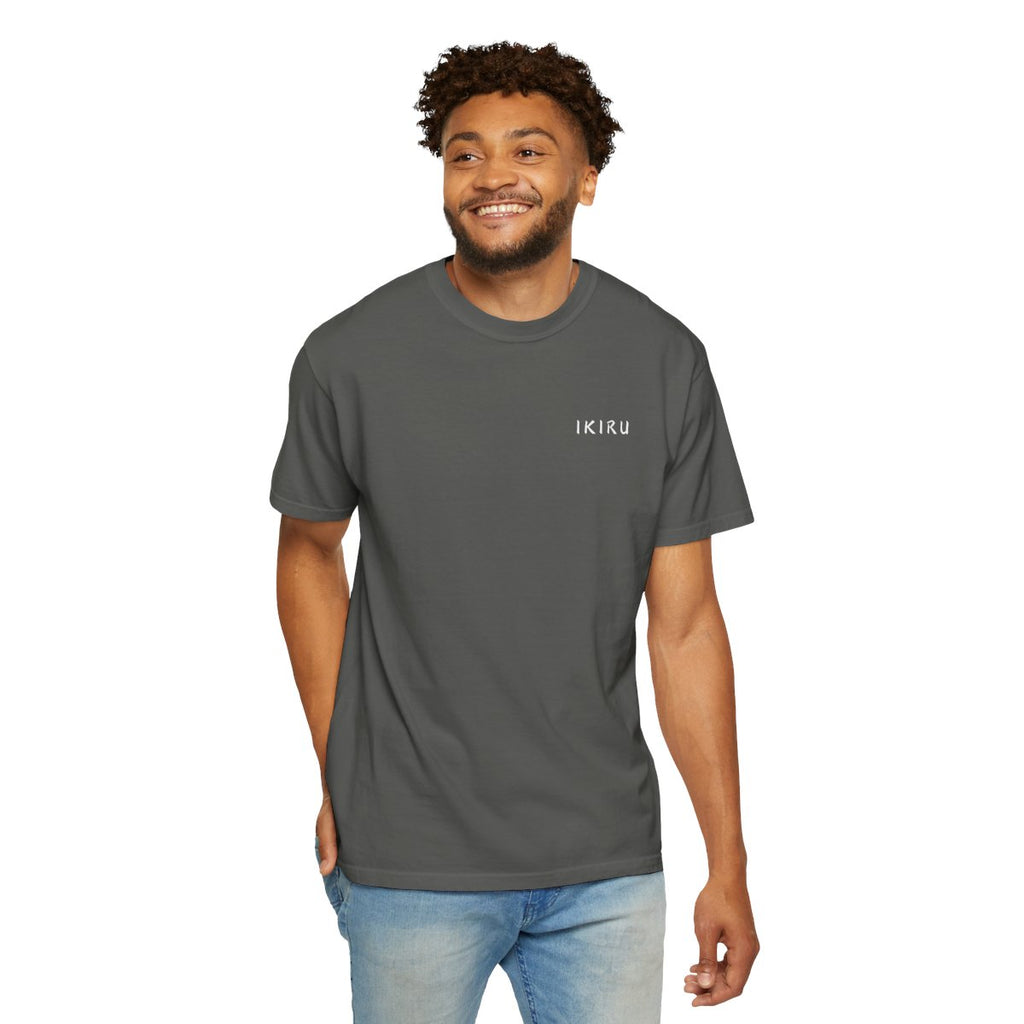 Man wearing a gray t-shirt with a logo on a white background