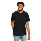 Man wearing a black t-shirt with 'IKIRU' text on a white background