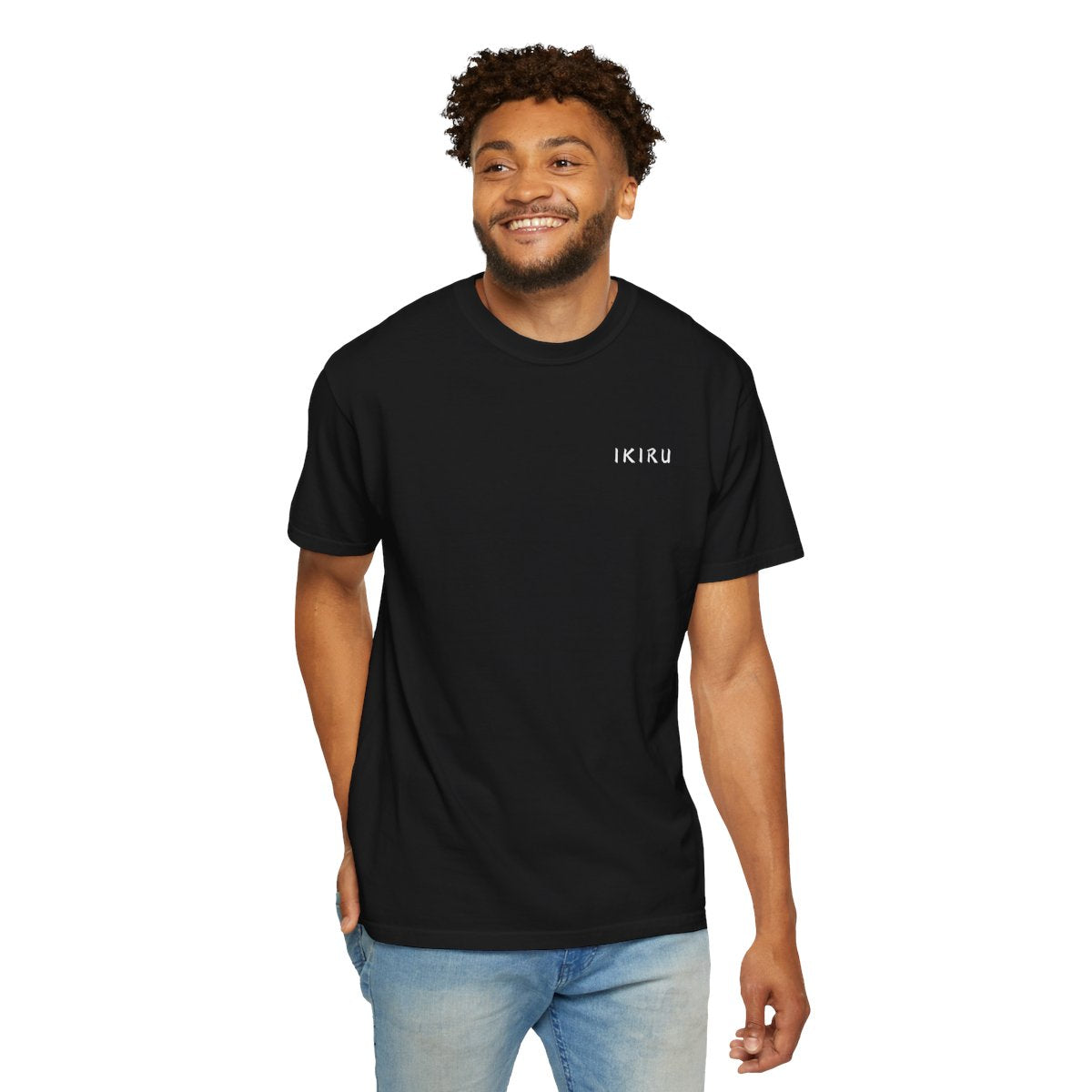 Man wearing a black t-shirt with 'IKIRU' text on a white background
