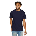 Man wearing a navy blue t-shirt with 'IKIRU' text on a white background