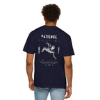 Person wearing a navy blue t-shirt with a graphic of Earth on the back